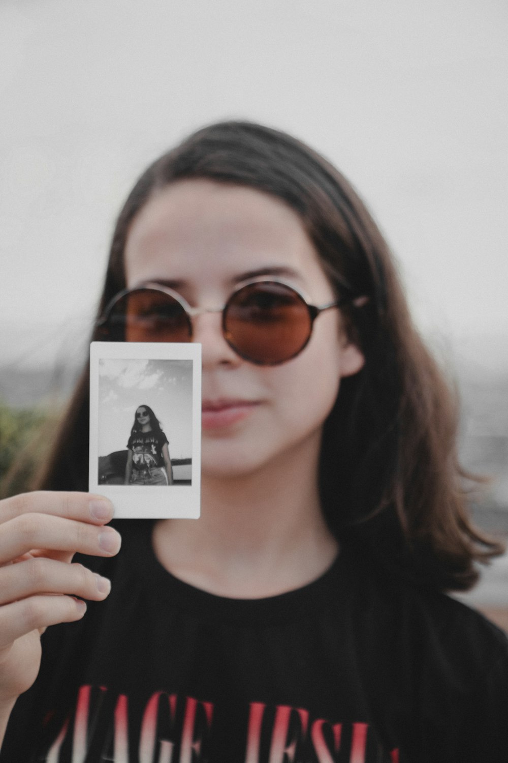 woman holding photo