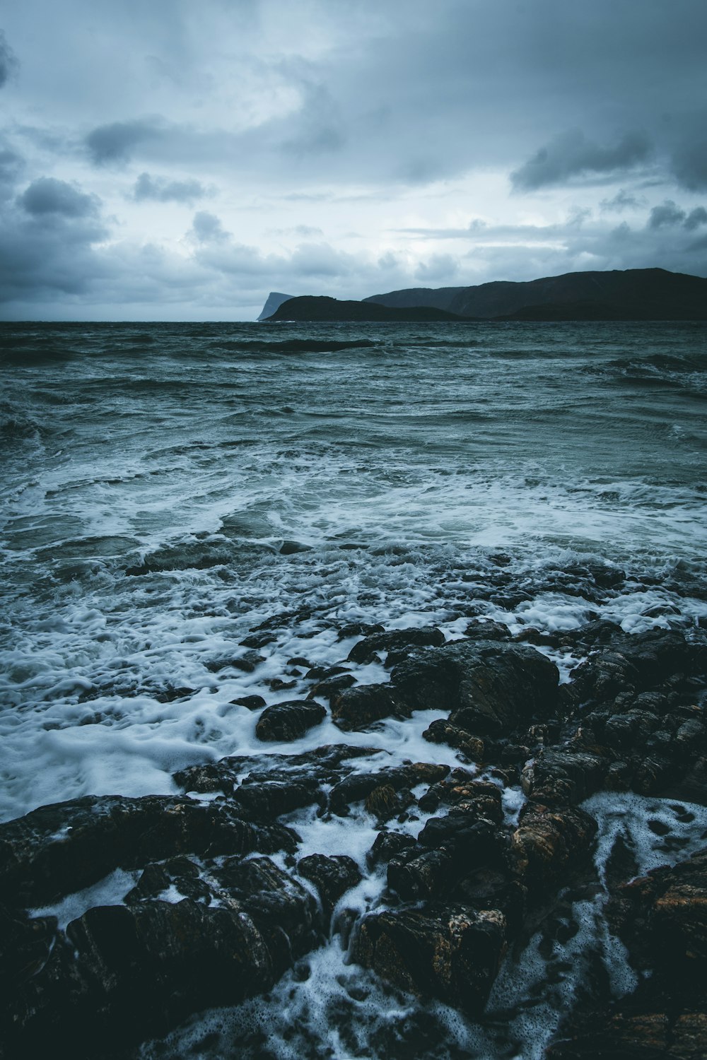 sea waves under gray sky