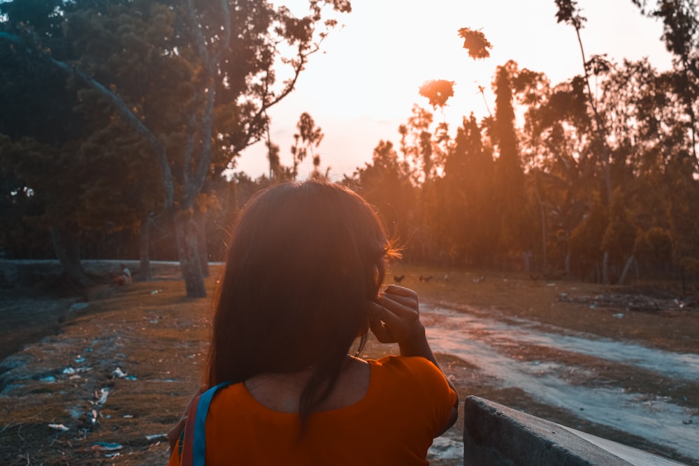 woman holding her hair