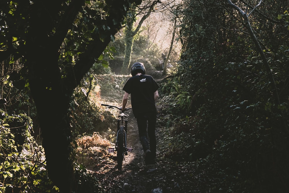 man holding bike