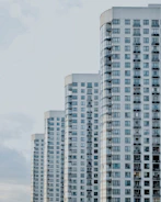 four white painted buildings