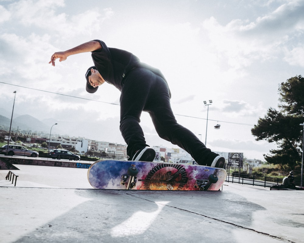 man riding skateboard doing tricks