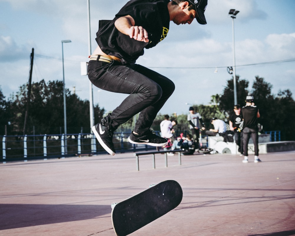 skateboarding man during daytime