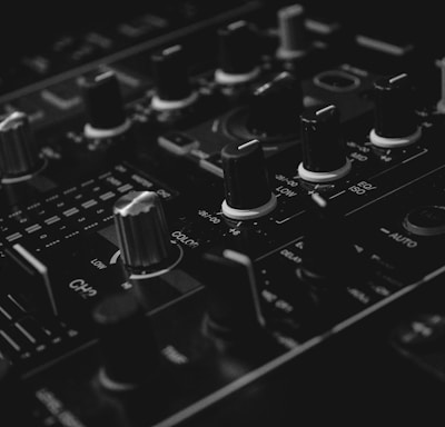 black audio mixer in closeup photography