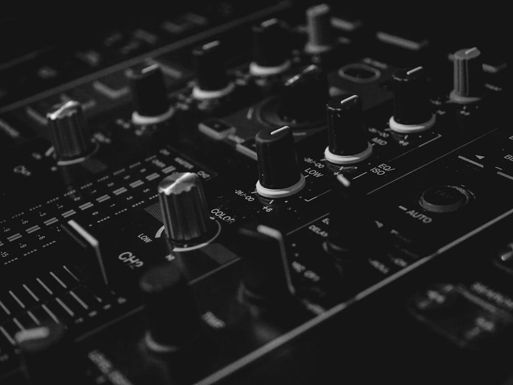 black audio mixer in closeup photography