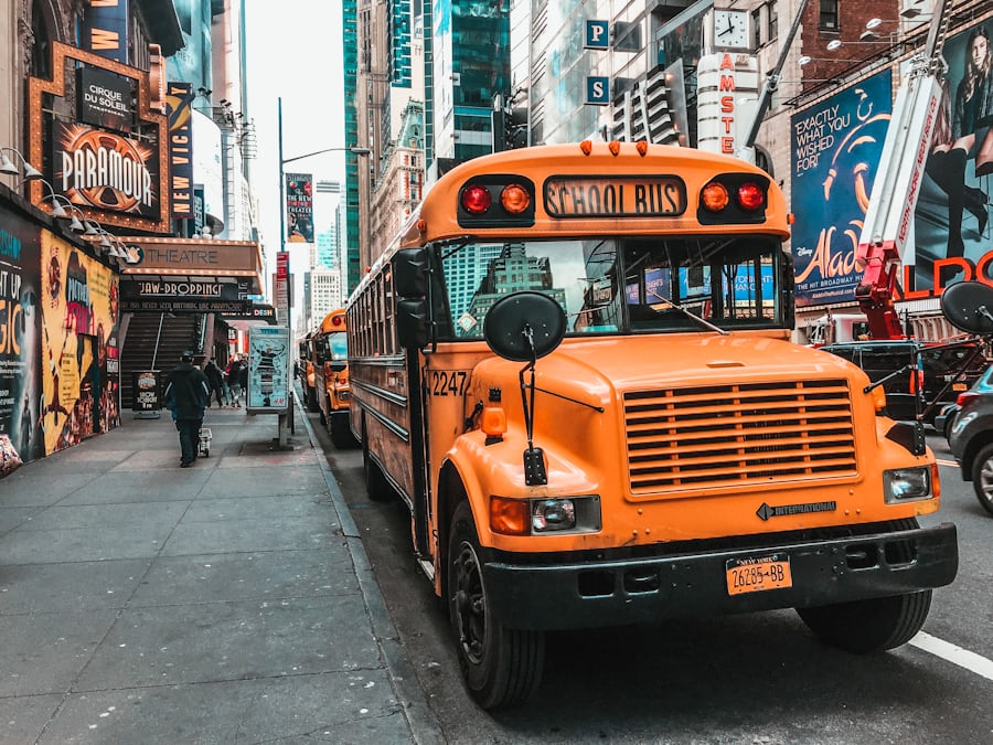 A school bus on Broadway, New York City (Jannis Lucas via Unsplash)