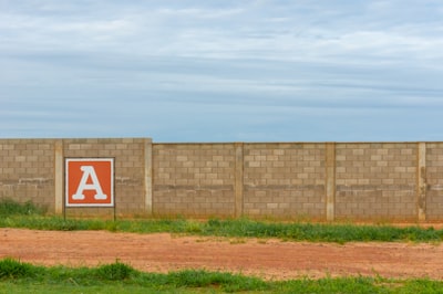 brown and white a road sign division zoom background