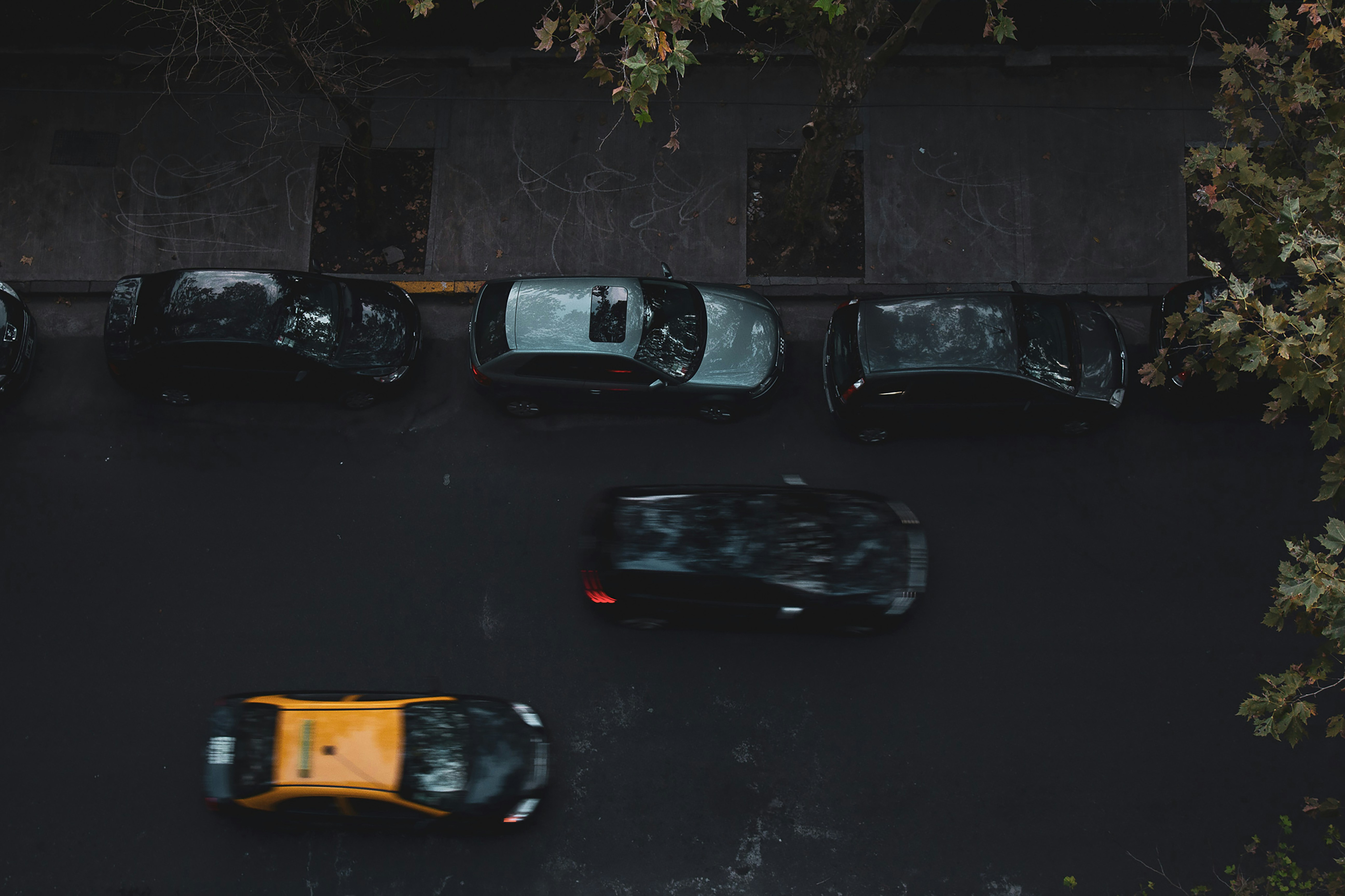 vehicles parked beside road, 