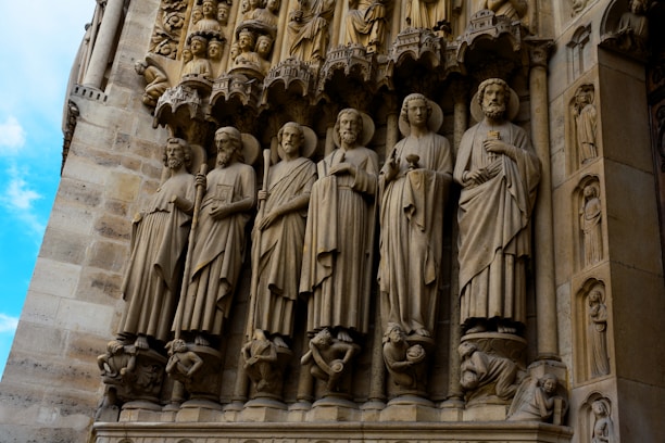 high-relief sculptures of men