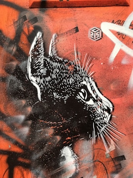 A black and white portrait of a pet with graffiti style.