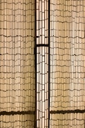 a room divider made out of bamboo sticks