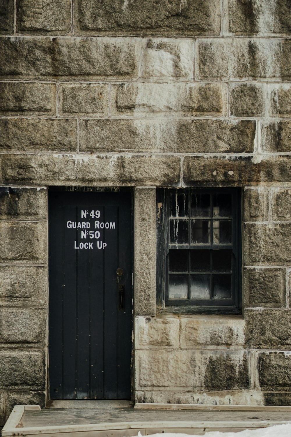 closed black wooden door