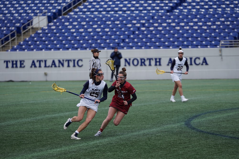 women playing lacrosse