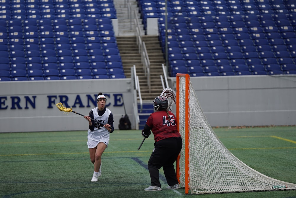 women playing lacrosse