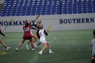 Players intensely focused during a match of ultimate frisbee, showcasing agility and teamwork.