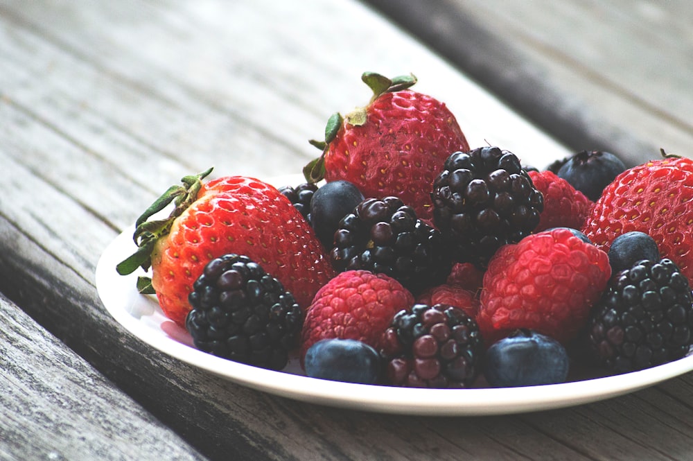 blueberries and strawberries on plate