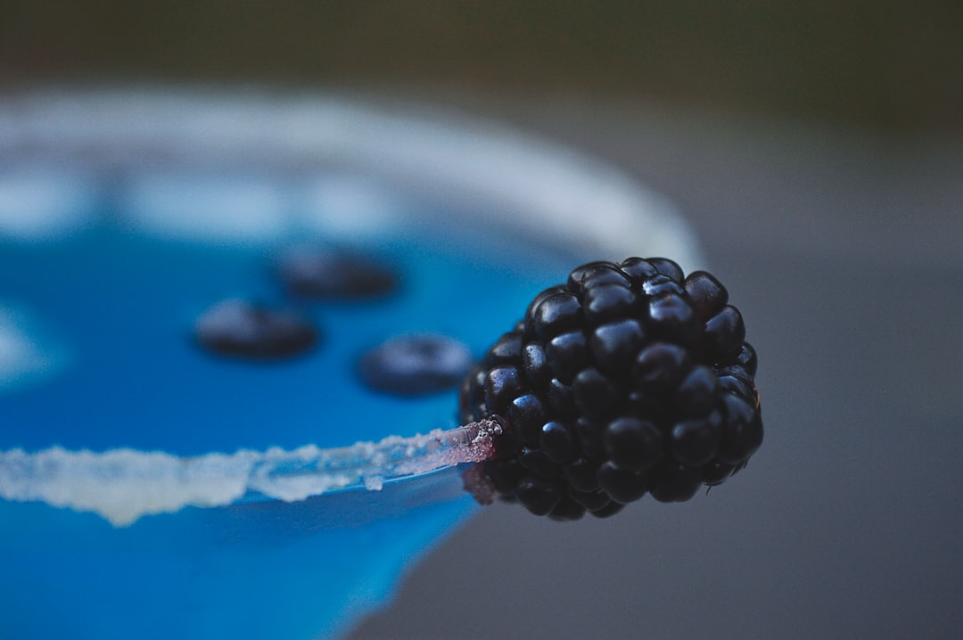 blackberry fruit on side of glass