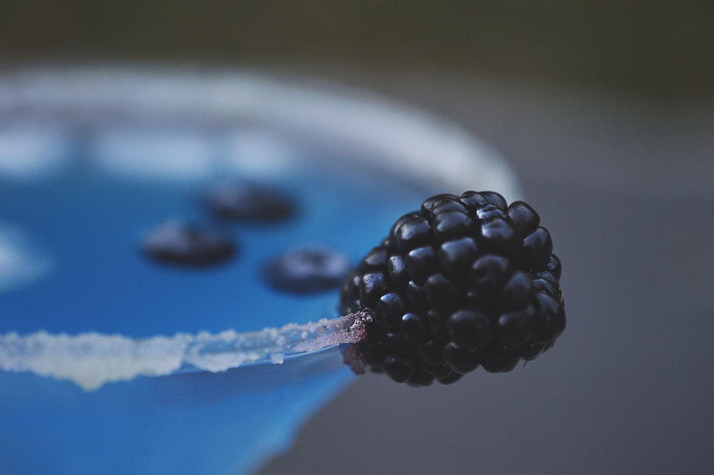blackberry fruit on side of glass