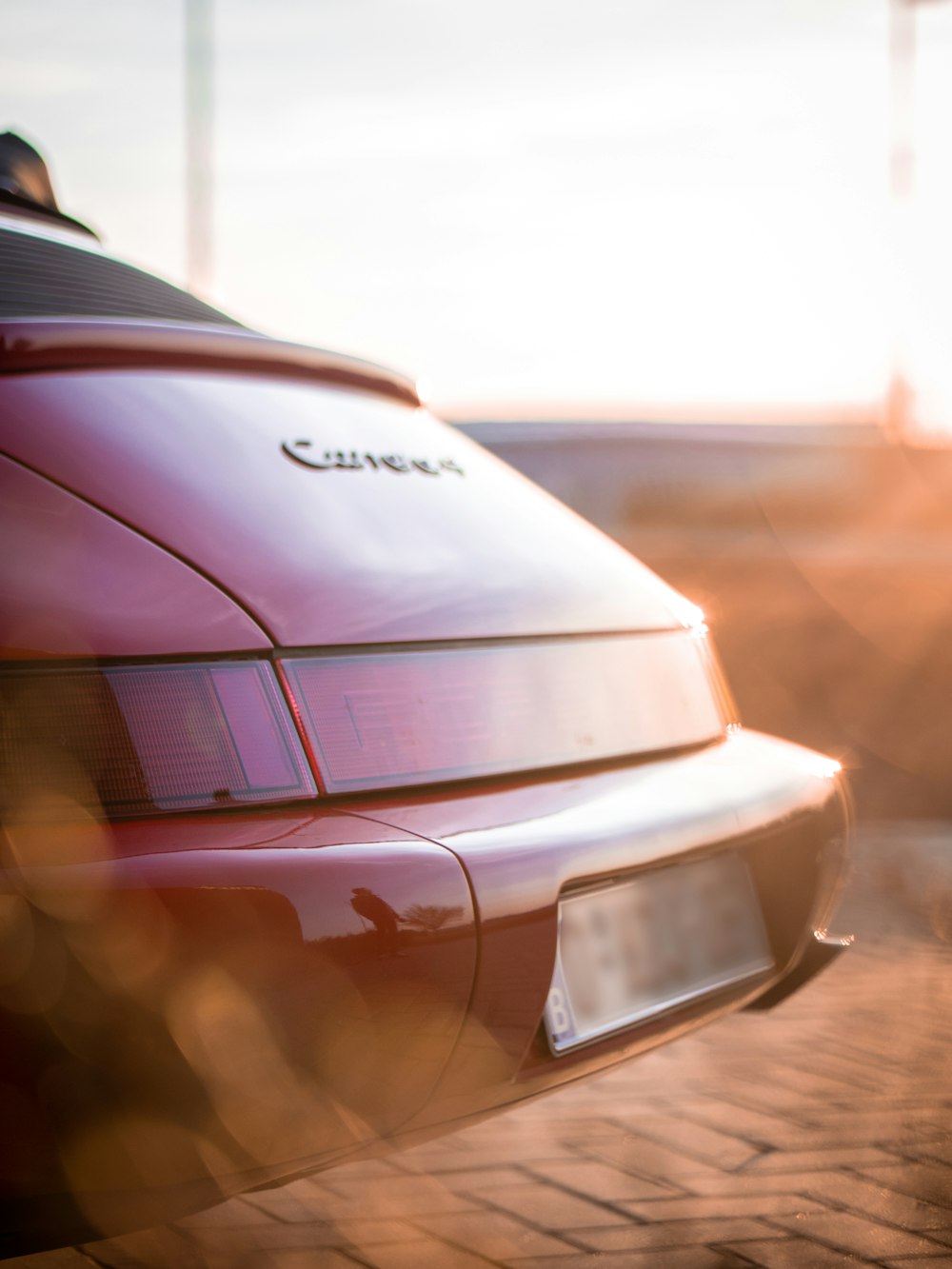 selective focus photo of red car