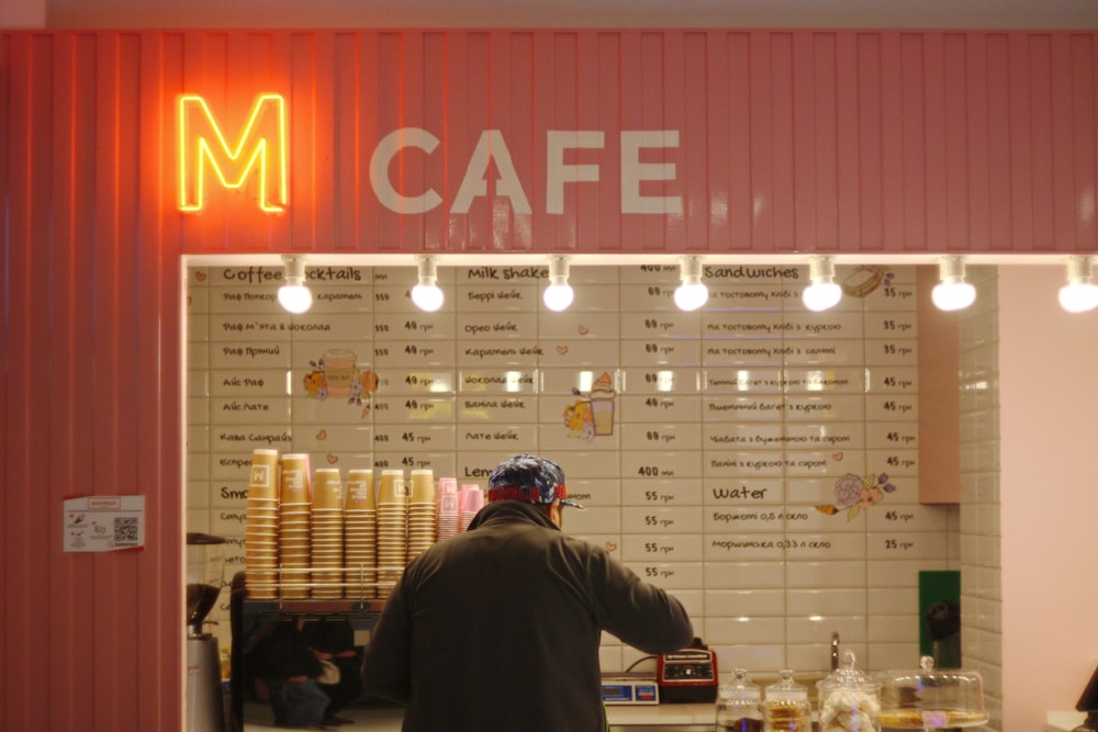 M cafe logo