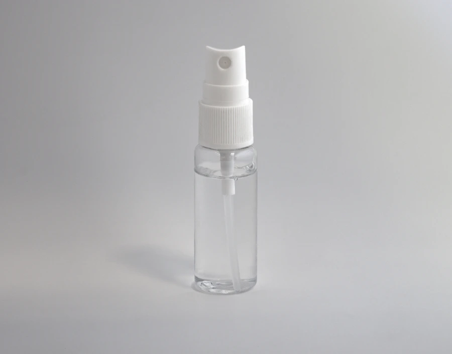 Glass spray bottle of natural room fragrance