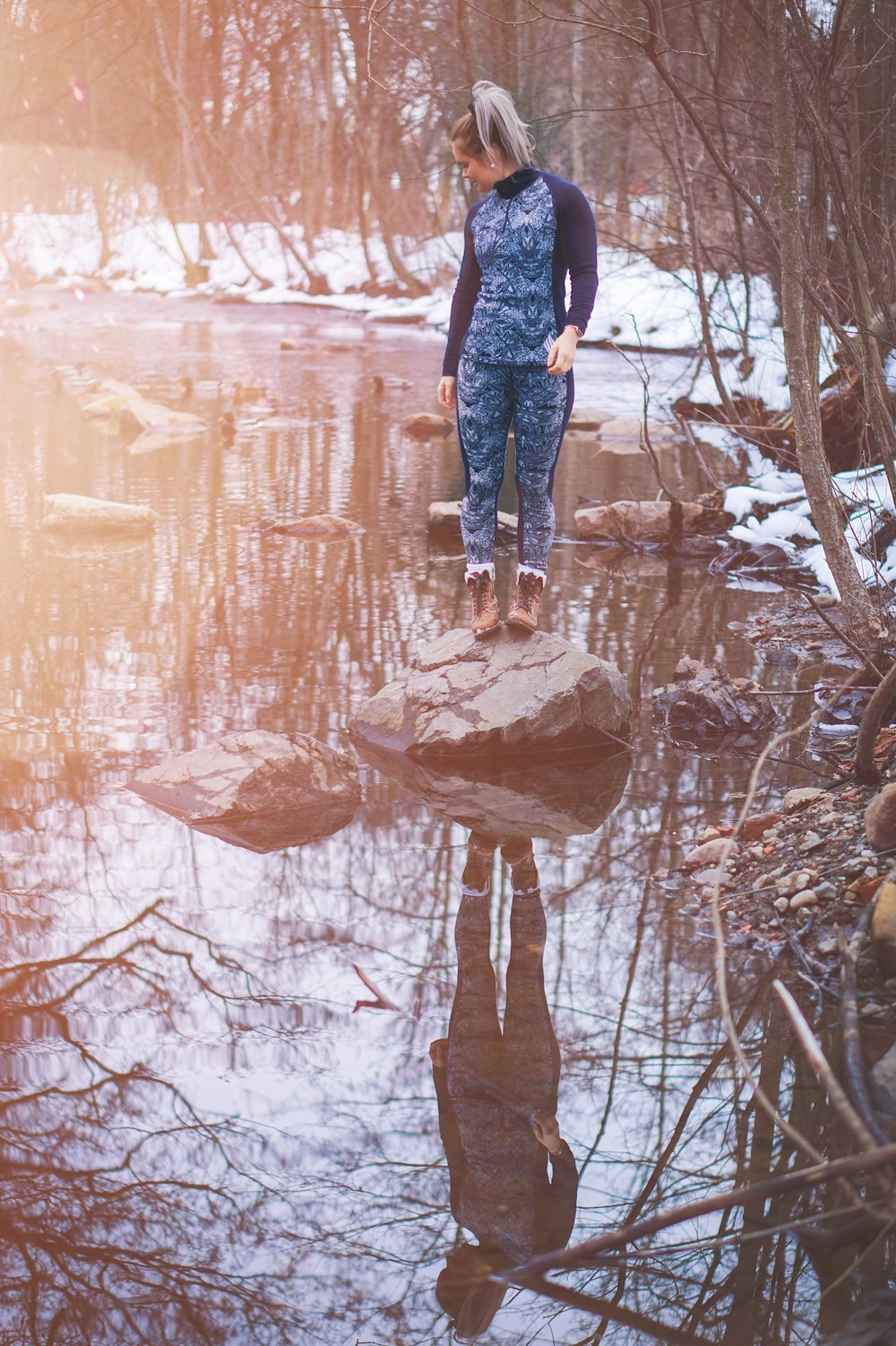 woman standing on stone