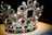 A luxurious crown adorned with an array of precious gemstones and pearls. The design features large red and green stones surrounded by a multitude of smaller clear crystals, creating an intricate and opulent pattern.