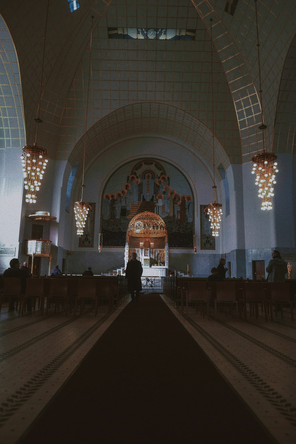 man standing inside church