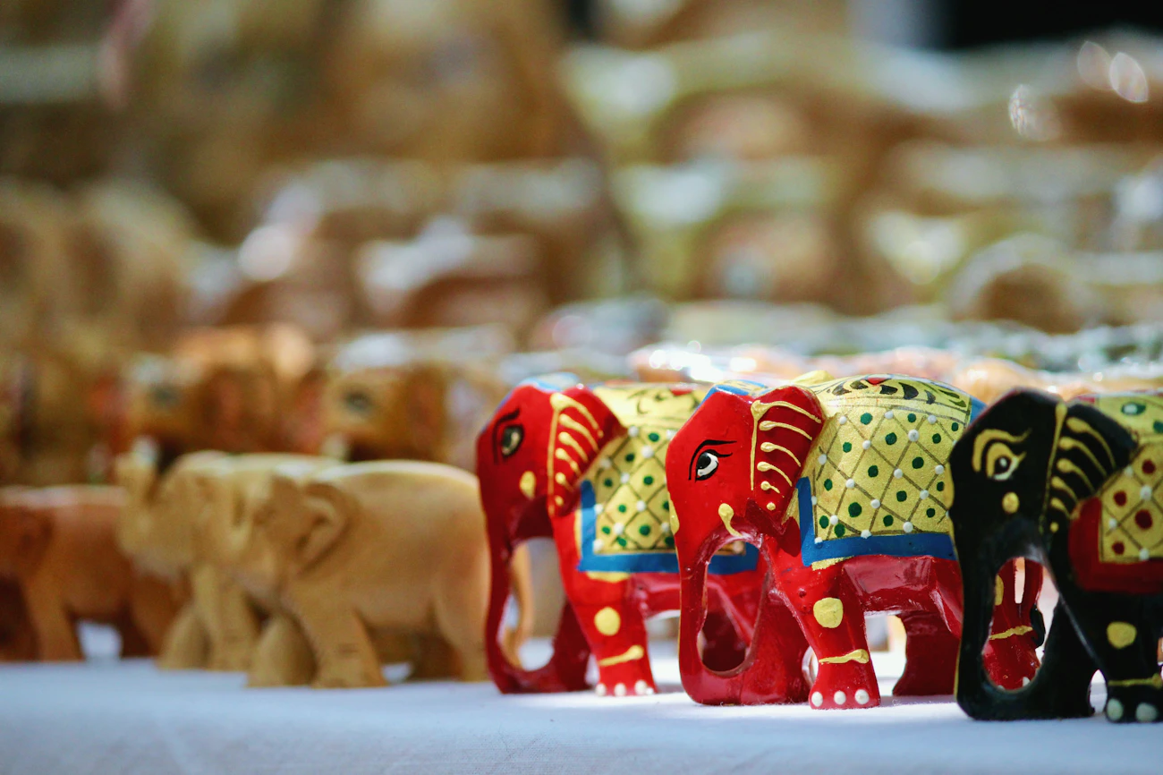 Three carved elephant figurines
