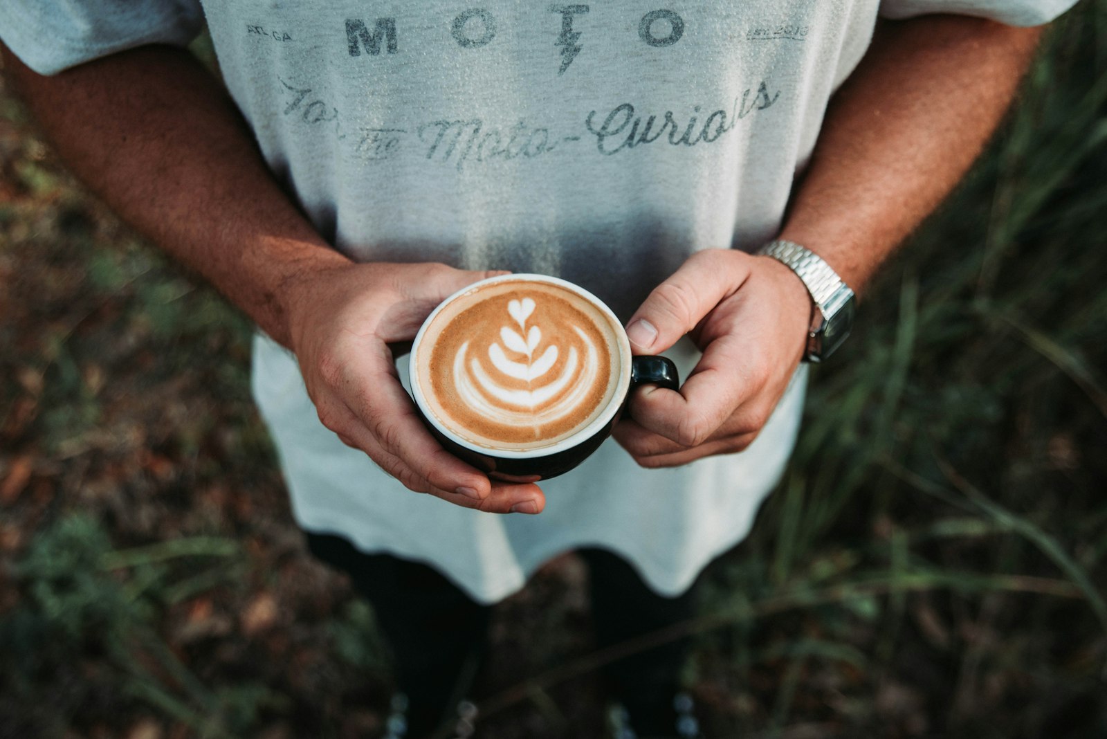 Sigma 24-70mm F2.8 EX DG HSM sample photo. Person holding coffee latte photography