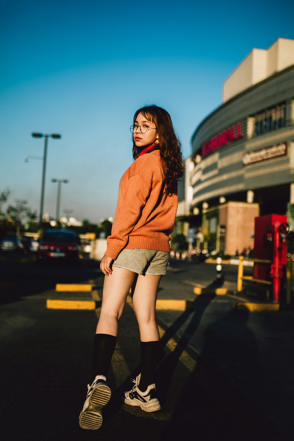 woman wearing brown sweater