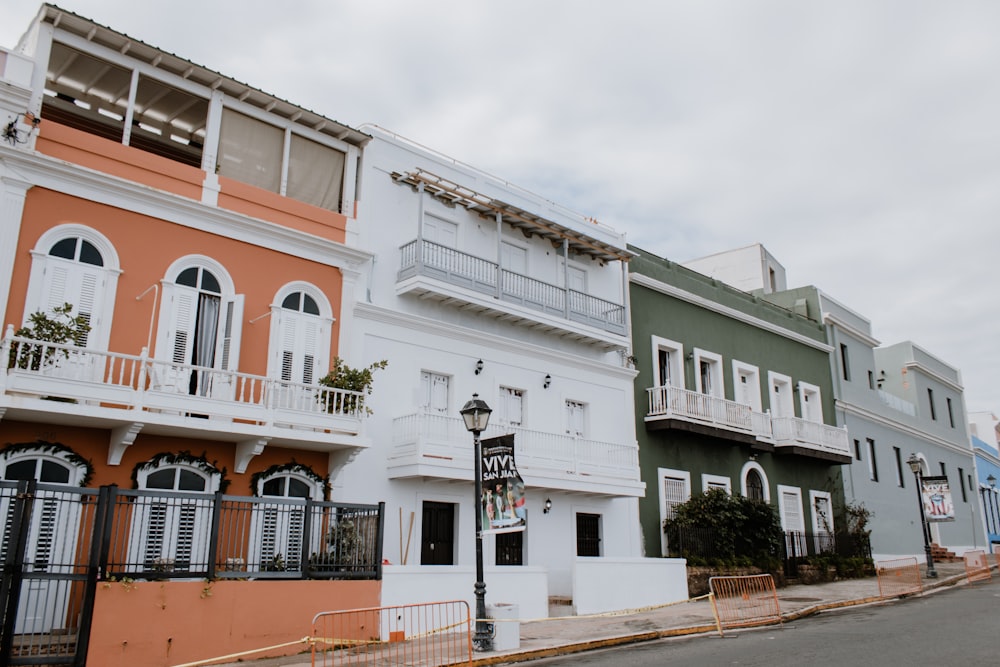 four different color house buildings