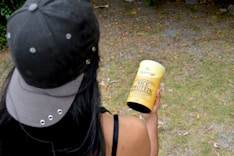 A lifestyle image showing a person using a health product while exercising outdoors