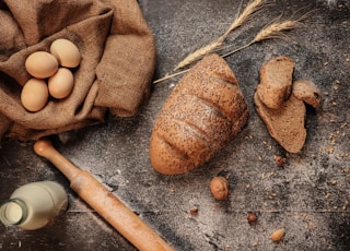 eggs, bread, milk, and rolling pin