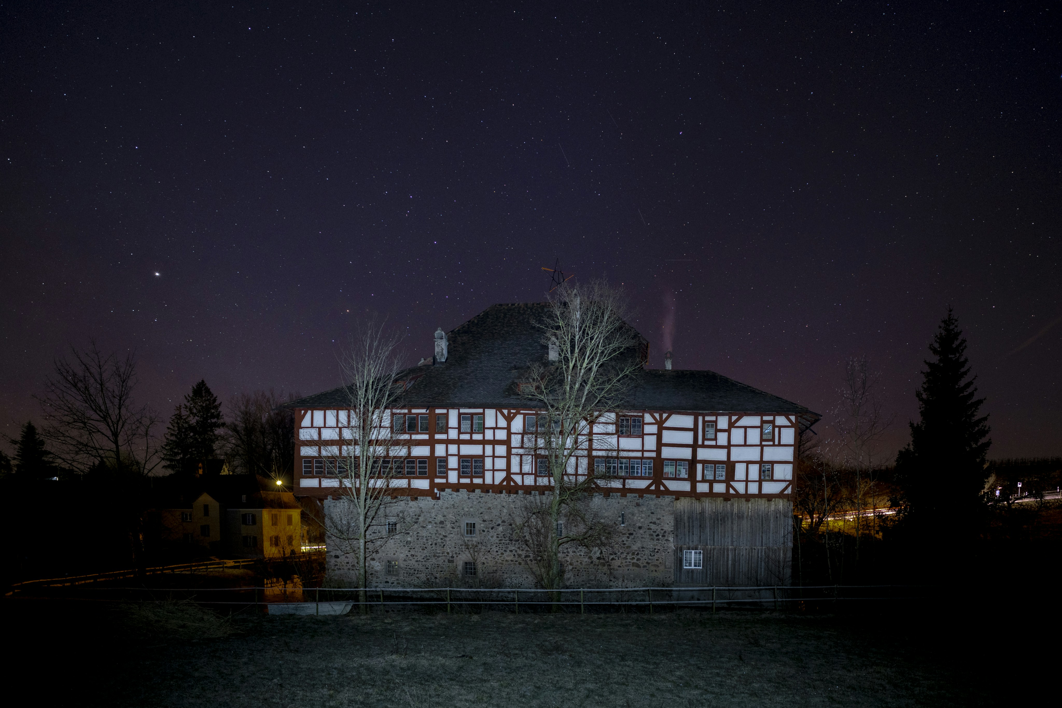 white and black house at nighttime