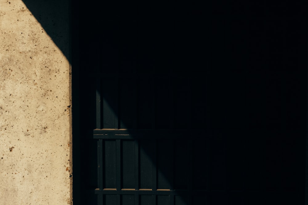 a black and white photo of a door and a window