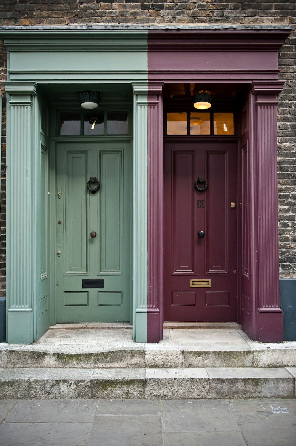 photo of two maroon and green door panels