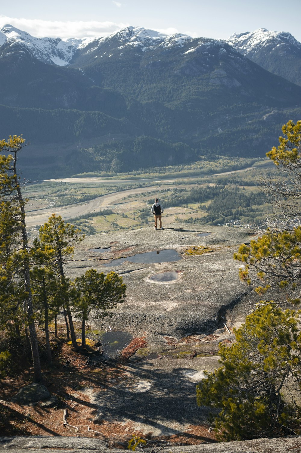 man stands at the cliff