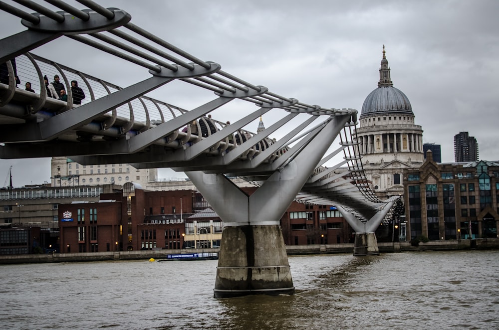 people on bridge during daytime