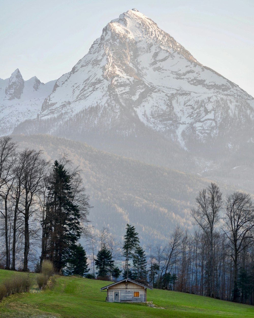 white bungalow house across white mountain