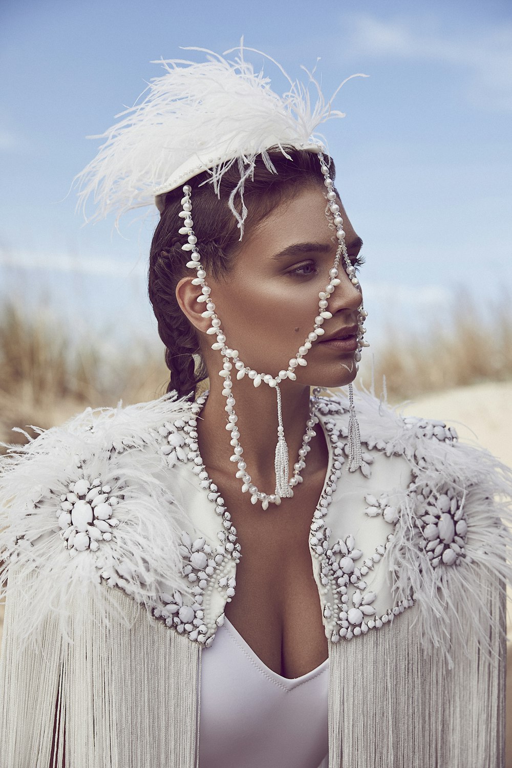 woman wearing scarf and white top