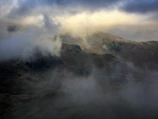 Mist gently rolling over the Haouaria mountains in early morning light