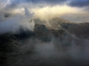 Mist gently rolling over the Haouaria mountains in early morning light