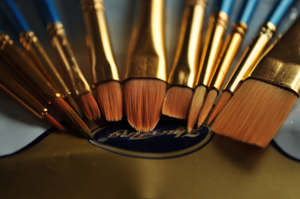 selective focus photography of makeup brush set