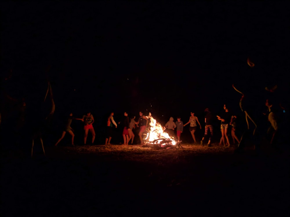 people around bonfire