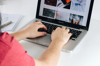 person using MacBook Pro
