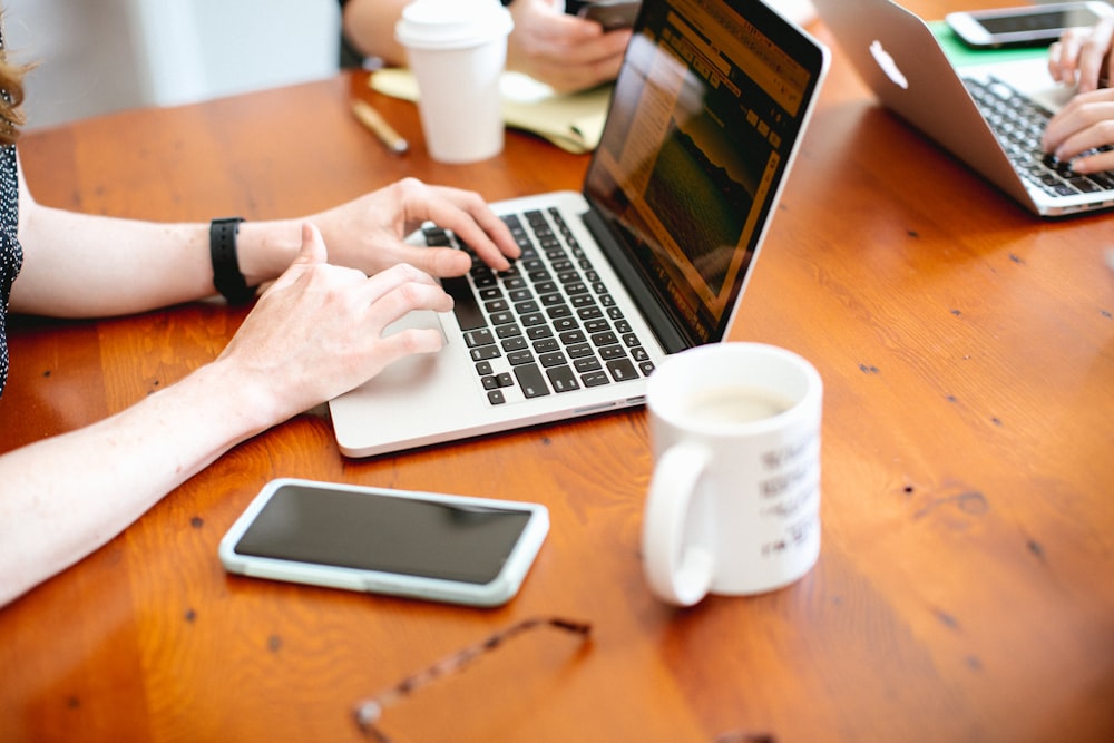 woman using MacBook Pro