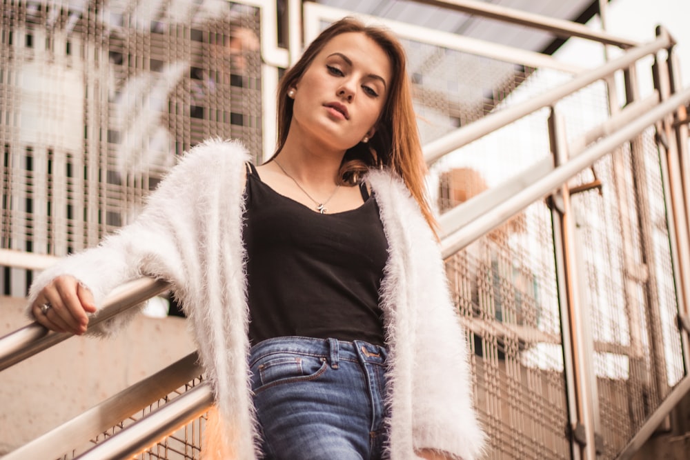 woman wearing white fur coat