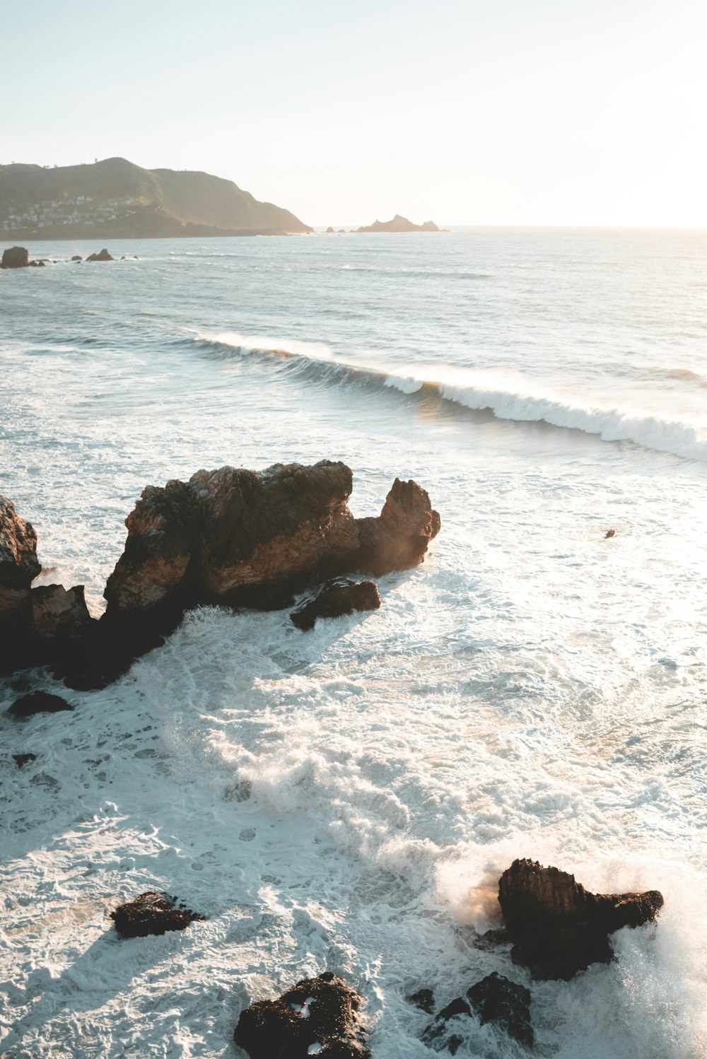 seawaves near mountain