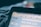 A computer screen displaying a web browser with multiple open tabs, including one for Gmail showing part of the interface and inbox. The focus is on the top section of the browser window, visible tabs, and the URL bar.